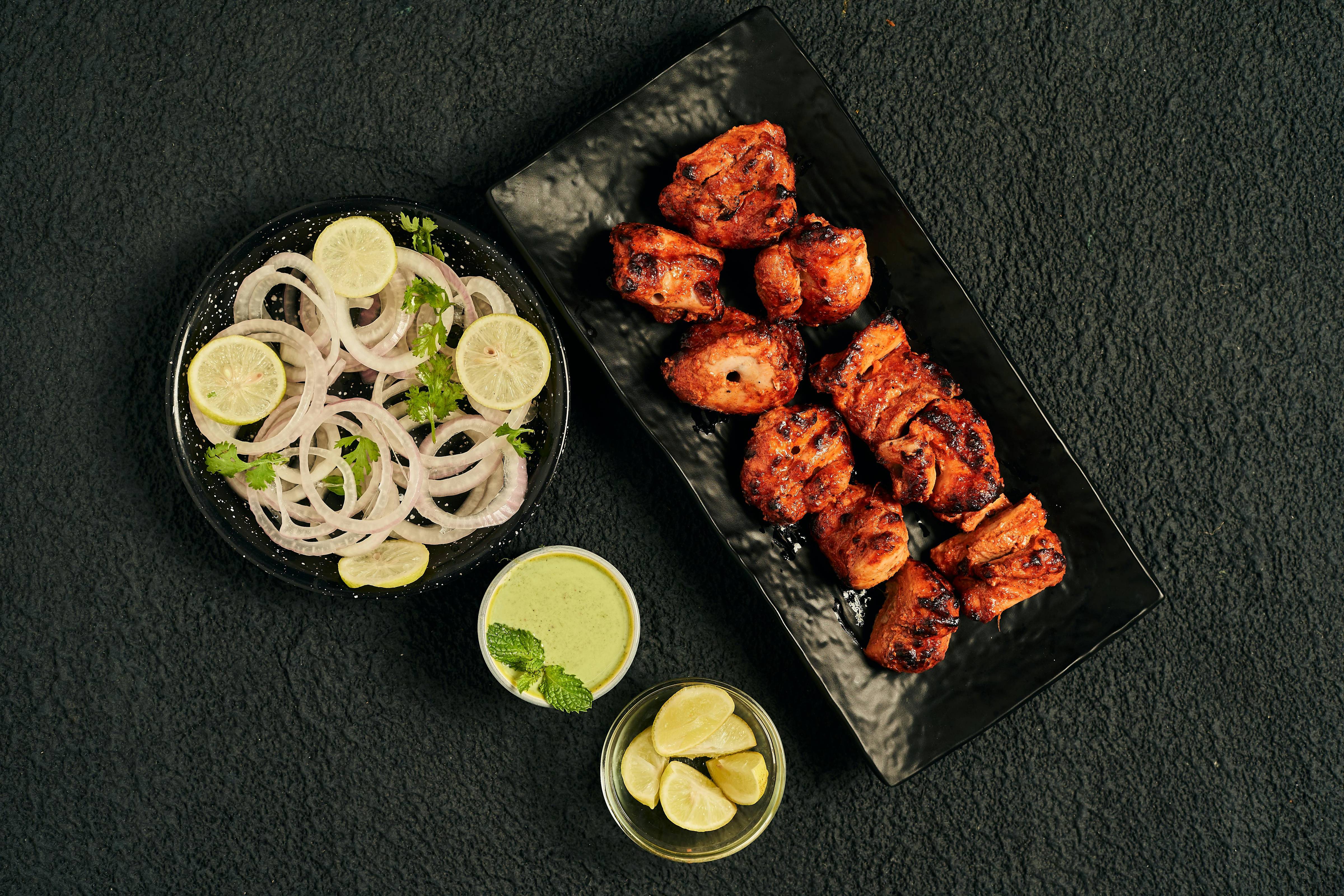 Tandoori chicken tikka and seekh kebab fresh from the tandoor at Apna Spicy Hut Winnipeg